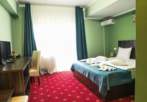 Postel nebo postele na pokoji v ubytování Hotel Aby Baile Felix