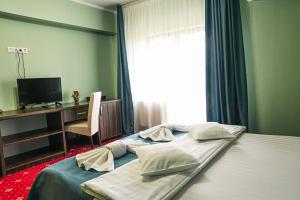 Postel nebo postele na pokoji v ubytování Hotel Aby Baile Felix