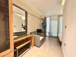 Posezení v ubytování Fitas Oda Hotel