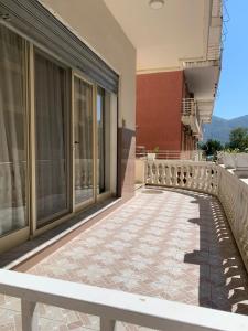 a balcony of a building with a walkway at Mira Orikum in Orikum