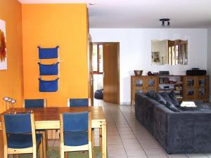 a living room with a couch and a table at Casa Luna by HolAp SA in Cugnasco