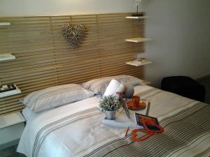 Letto o letti in una camera di Como Via Carcano 13