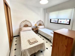 Ένα ή περισσότερα κρεβάτια σε δωμάτιο στο Finestrat La Cala primera linea +29 φωτογραφίες