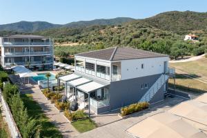 an aerial view of a house with a pool at Astra Sarti Luxury Suites in Sarti