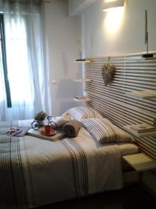 Letto o letti in una camera di Como Via Carcano 13