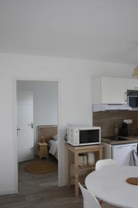 Køkken eller tekøkken på Bella Vista - Appartement 1 chambre
