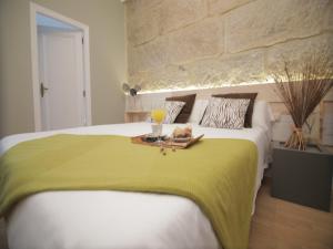 Postel nebo postele na pokoji v ubytování Hotel Alda Estación Vigo + 37 fotografií