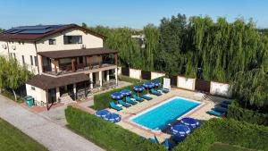 an aerial view of a house with a swimming pool at Casa Vlad in Murighiol