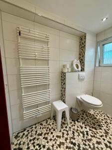 Koupelna v ubytování ZK Living Ferienwohnung EG + 2 fotografie