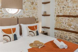 Postel nebo postele na pokoji v ubytování Anassa 14 Luxury One Bedroom Maisonette