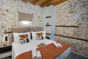 Postel nebo postele na pokoji v ubytování Anassa 14 Luxury One Bedroom Maisonette
