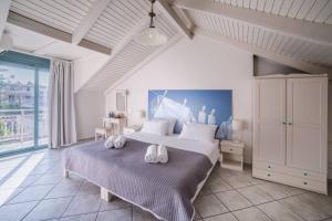 Voodi või voodid majutusasutuse Pierros Hotel toas