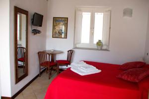 Postel nebo postele na pokoji v ubytování B&B Amphisya