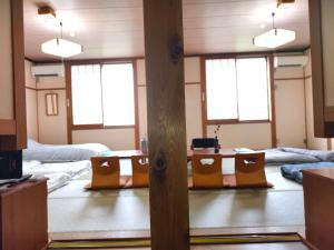 Letto o letti in una camera di 旅館青柳 海越し立山連峰の雪山絶景で休もう