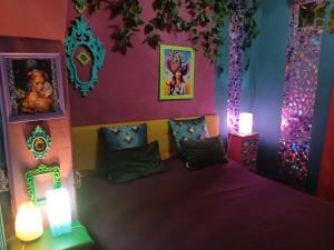 A bed or beds in a room at MAISONETTE Fata Bislacca, calcata
