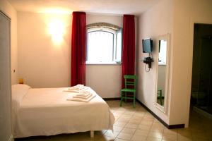 Postel nebo postele na pokoji v ubytování B&B Amphisya