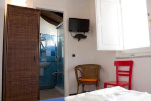 Postel nebo postele na pokoji v ubytování B&B Amphisya