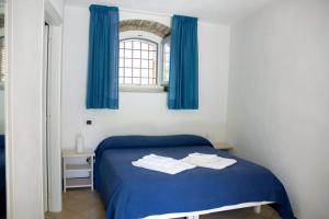 Postel nebo postele na pokoji v ubytování B&B Amphisya