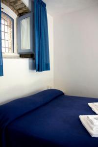 Postel nebo postele na pokoji v ubytování B&B Amphisya