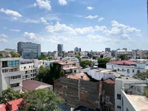 a view of a city with buildings at Central Artsy Studio, self check-in! in Bucharest