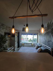 Ένα ή περισσότερα κρεβάτια σε δωμάτιο στο Studio vue mer +11 φωτογραφίες