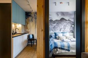 Ένα ή περισσότερα κρεβάτια σε δωμάτιο στο Apartament Blue Mountain