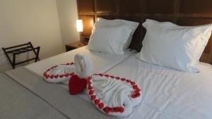 Postel nebo postele na pokoji v ubytování Hotel Adagio