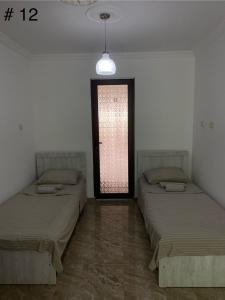 Letto o letti in una camera di Rezo's House