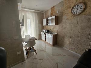 Dapur atau dapur kecil di Santa Caterina Home suite