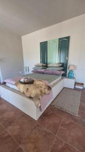 Ένα ή περισσότερα κρεβάτια σε δωμάτιο στο B&B Finca Conchales