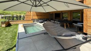 Bazén v ubytování Ziegelberg Chalets nebo v jeho okolí