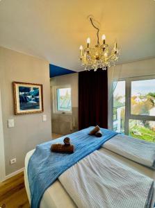 Postel nebo postele na pokoji v ubytování Luxury Rooftop Long-Term Apartment + 48 fotografií