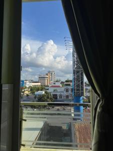 a view of a city from a window at Hưng Thịnh 1 in Can Tho