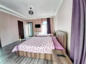 Postel nebo postele na pokoji v ubytování Villa in Bakuriani