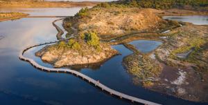 an aerial view of an island in the water at Suite Bleuet in Peyriac-de-Mer +4 photos