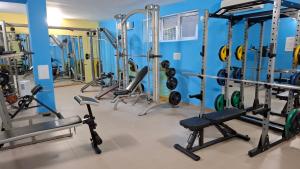 a gym with several treadmills and machines at Comfortable Studio in Sunset Resort Complex, Kosharitsa in Kosharitsa