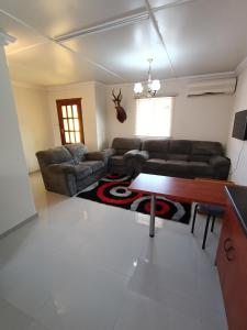 Posezení v ubytování Ezulwini Air B&B