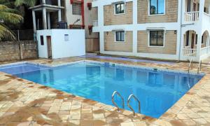 Πισίνα στο ή κοντά στο Nieyela apartment in Diani