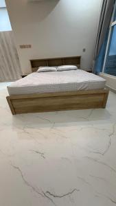 Cama ou camas em um quarto em رذاذ طاقه R-Taqah