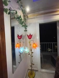a room with a group of lights on the wall at قريه بورتو جولف مارينا in El Alamein