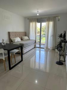 Ένα ή περισσότερα κρεβάτια σε δωμάτιο στο Em Departamento Amoblado Cordoba