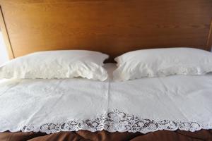 Postel nebo postele na pokoji v ubytování Domus Otium