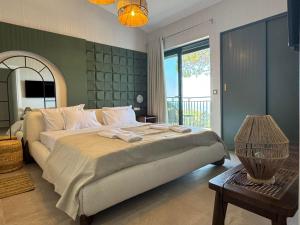 Postel nebo postele na pokoji v ubytování Xenia Sea view Villa by "Elite" + 31 fotografií