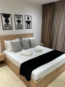 Ένα ή περισσότερα κρεβάτια σε δωμάτιο στο Appartement de luxe vue sur mer