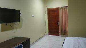 Μια τηλεόραση ή/και κέντρο ψυχαγωγίας στο Nangas Homestay