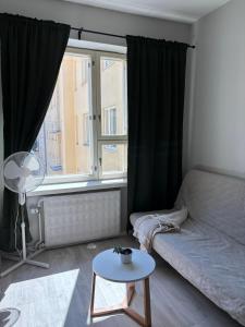 Postel nebo postele na pokoji v ubytování Foliate Living Verso