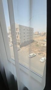 a view of a building from a window at استديو بوصول ذاتي غرفتين in Jazan +22 photos