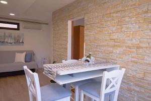 Posedenie v ubytovaní Apartment in Veli Losinj 33734