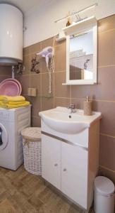 Kúpeľňa v ubytovaní Apartment in Veli Losinj 33734 + 13 fotografií
