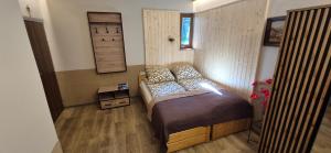 Posteľ alebo postele v izbe v ubytovaní Apartamenty w Centrum - Zakopane